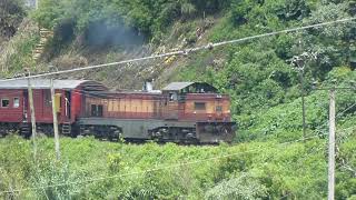 M6 diesel locomotive hauling passenger train in Haputale, Sri Lanka