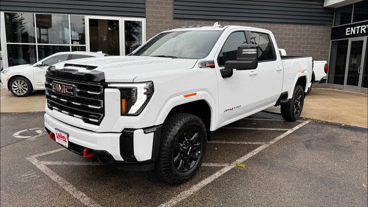 WeatherTech no drill mudflaps installed on 2026 GMC Sierra HD AT4
