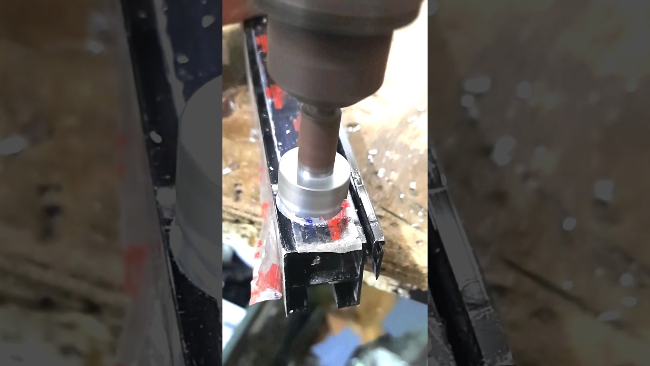 hole in aluminum window with drill machine bit | good workmanship and machinery tools