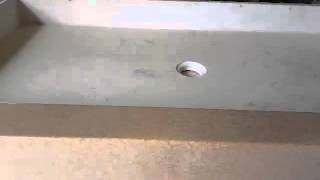 Solid surface shower base