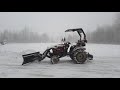 Yanmar SA424 snow plow.