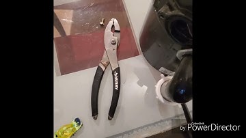 removed stuck tiny spoon from my garbage disposal (sorry no editing done)