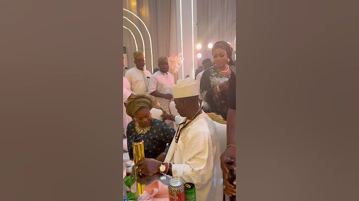 Eniola Ajao greets wasiu AYINDE at a wedding party