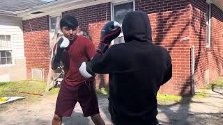 UPCOMING PRO BOXER (Black Hoodie) VS AMATEUR  FIGHTER (Red Shirt) ROUND 1