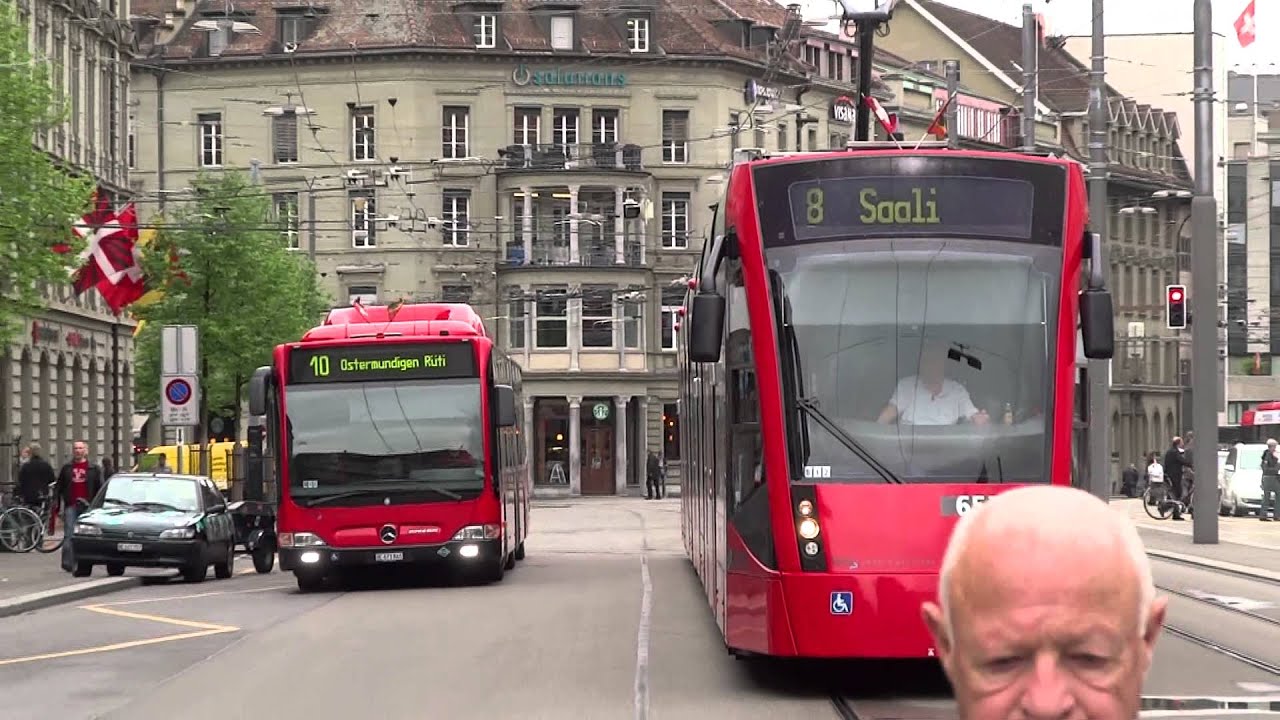 Streetcars and buses at the central station Bern 1