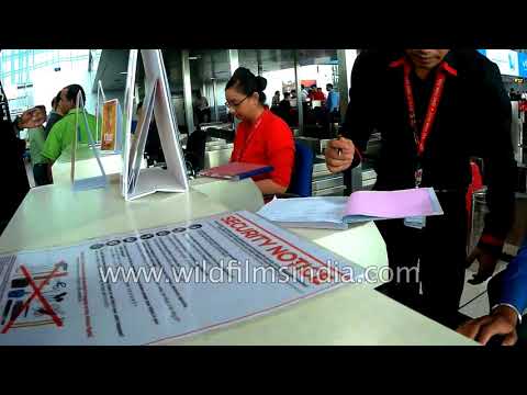 air-asia-check-in-counter,-baggage-belt-and-baggage-receipt-at-kolkata-airport