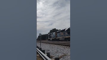 empty coal train passes slug set working Wildwood yard