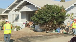 Koreatown hoarder: LA City crews clean up piles of junk outside home