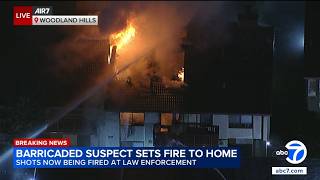 Hourslong LA barricaded suspect scene escalates to house fire with shots fired Hourslong LA barricaded suspect scene escalates to house fire with shots fired