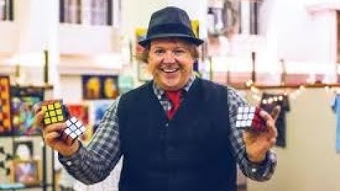 World Record - Solving 3 Rubik