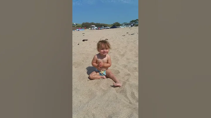 Ava dancing on the beach