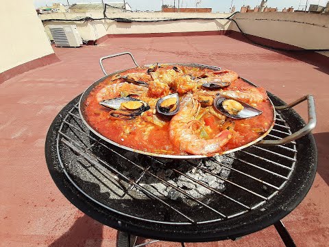 Vídeo: Com Cuinar La Barbacoa En Una Paella