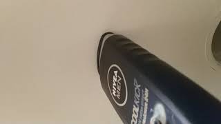 Killing a spider with a Nivea shampoo bottle