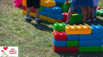 Playing with building blocks. Having fun with mega bloks. Lego Duplo bricks are fun.