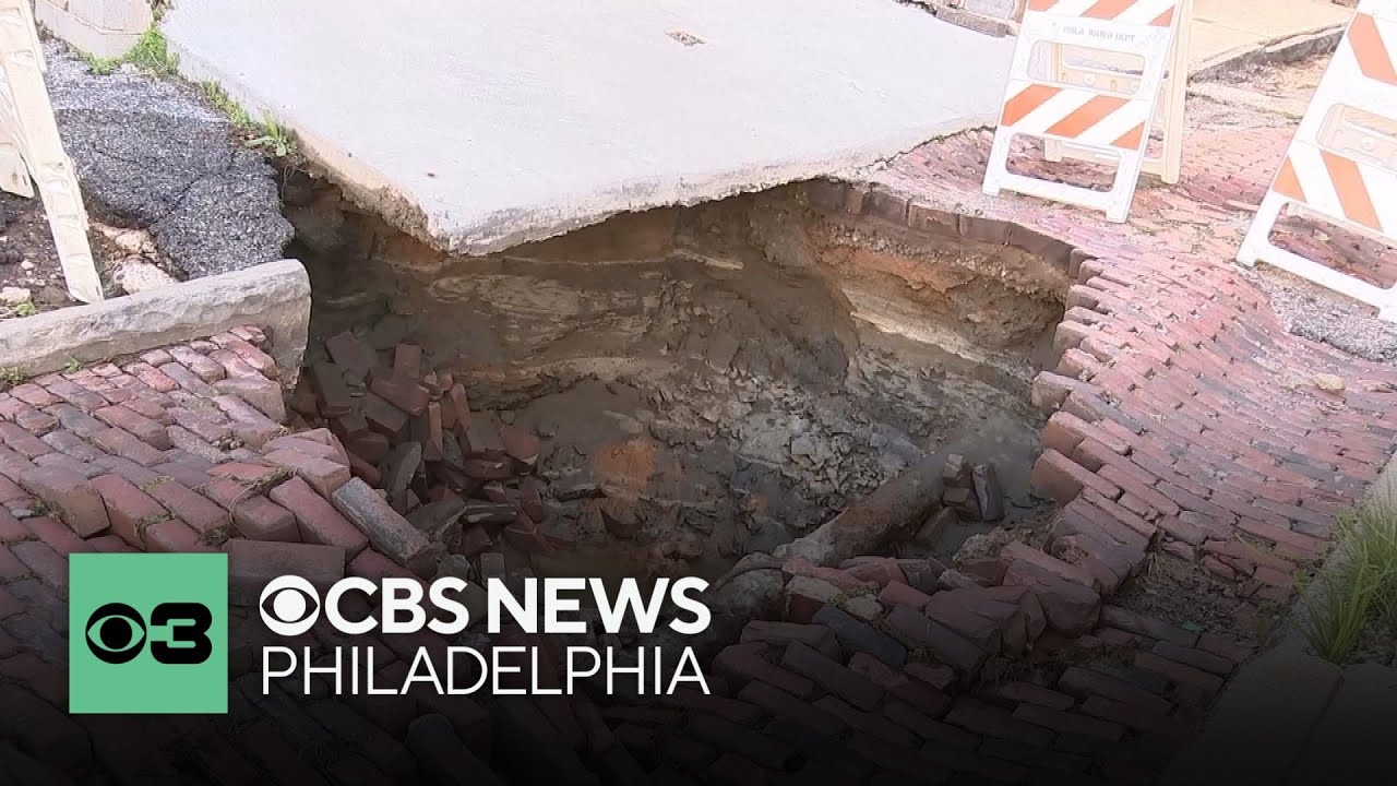 Portion of Manayunk street collapses after water main break - YouTube
