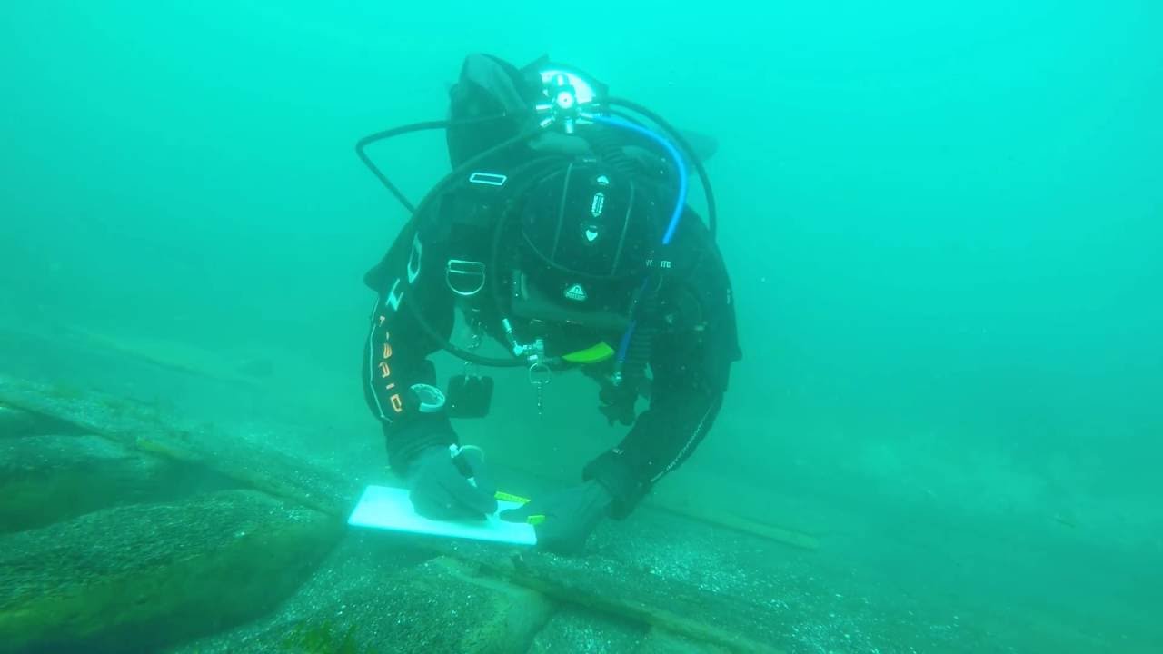 Marine Archaeologist at work - Cleaning and recording Iceland's oldest shipwreck Melkmeid