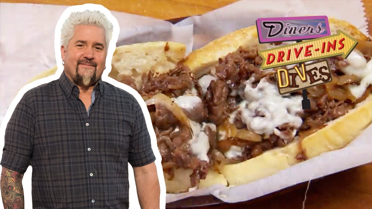 Guy Fieri Eats a Cheesesteak on HOMEMADE Bread | Diners, Drive-Ins and Dives | Food Network