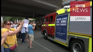 【ロンドン火災】　現場離れる消防車に住民拍手