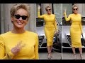 Sharon Stone looks mellow in yellow as she defies the ageing process in a figure hugging dress