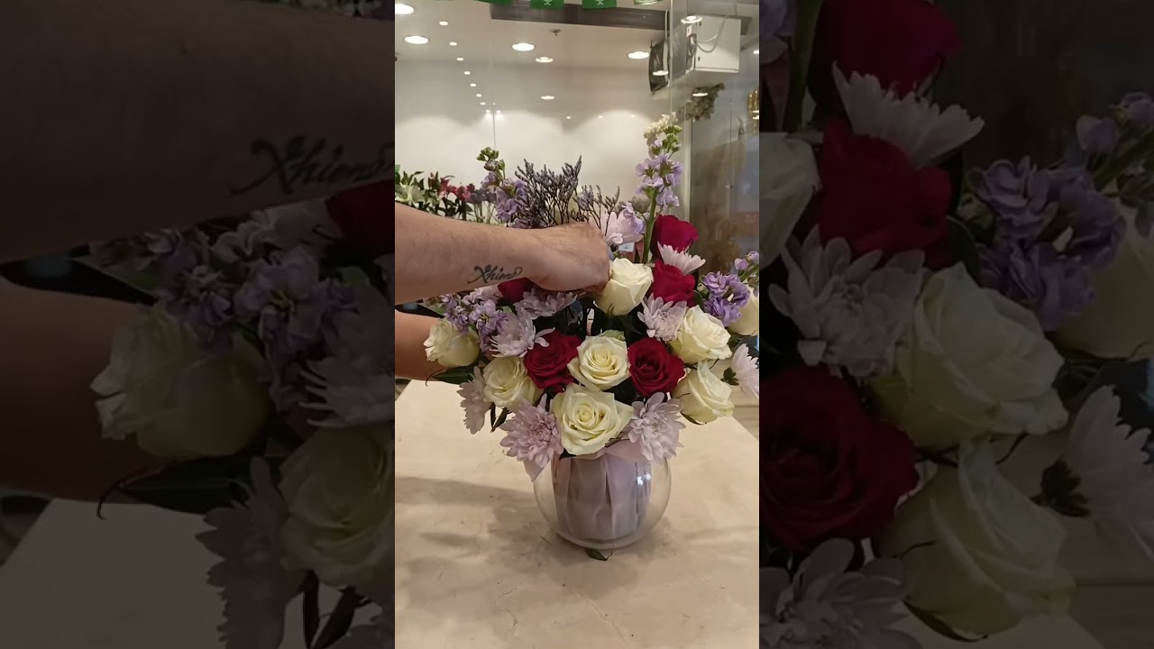 Glass bowl flower arrangement 