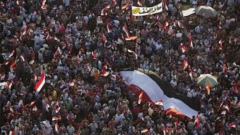 Pro- and anti-Morsy crowds flood streets