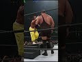 Big Show gets planted through a table!