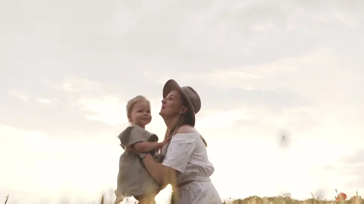 Woman Playing with Her Baby