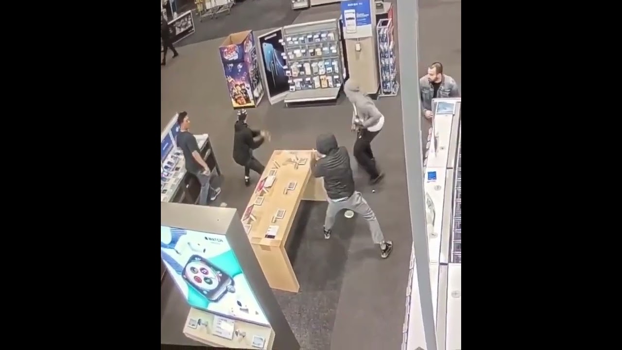 Best Buy Employees Lined Up in Cover 3 Defense to Stop Shoplifters from Stealing Phones and Tablets