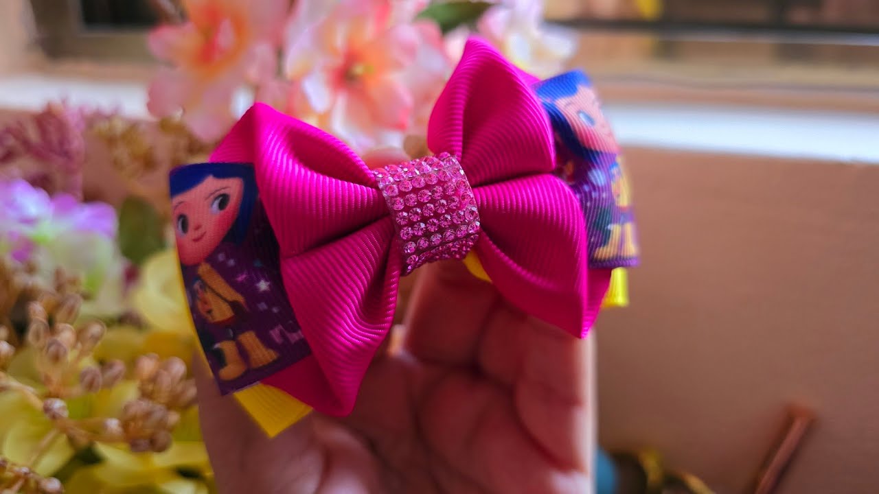 moñito fácil de realizar con listón de 3.8cm .