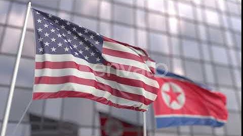 Flags of the USA and North Korea in Front of a Skyscraper | Motion Graphics - Envato elements