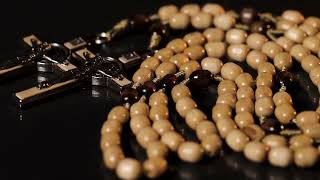 Amazon product advertising video for a beige rosary