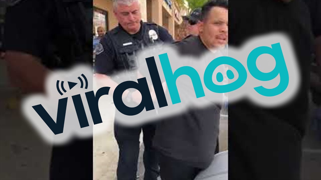 Police Officer and Man Engage in Altercation || ViralHog - YouTube