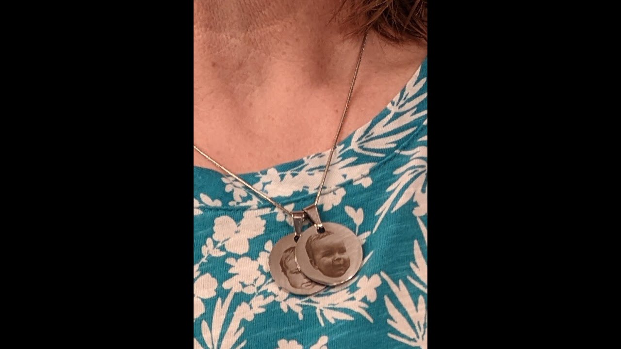 Laser engraving on stainless steel necklace pendants with the Opt