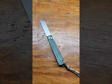 A One Of A Kind Button Lock Knife!!