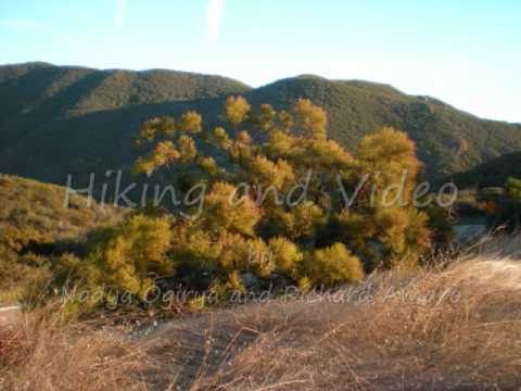 'Videographer Richard Amaro and Nadya Ogirya hike the Mishe Mokwa and Backbone trails in Sandstone Peak National Park, Ventura County, California.