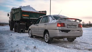 Old Chinese Car drives under truck at speed