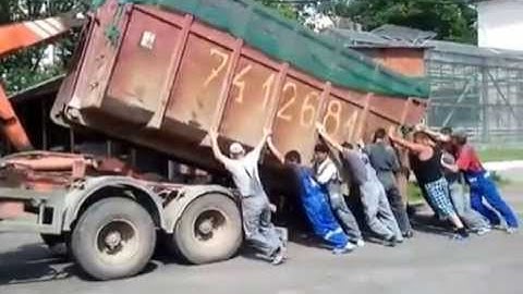 Hook Lift Truck loading up a container [Funny Video]