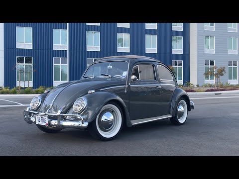 100% electric. 100hp. 1958 VW Beetle with ragtop sunroof in Anthracite.