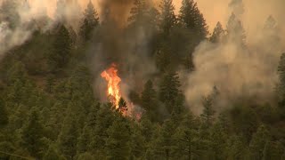 Colorado wildfires rage amid fears of flash flooding