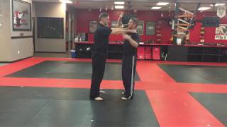 2 Hand Choke Hand Raised Defense