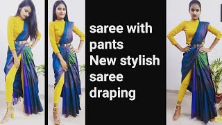 how to wear saree with pants. saree draping tutorial. wear a pant style saree. pants ke sath sari .