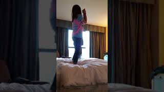 20150327 Emily teach mom cheer in hotel room