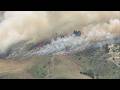 Fast-moving brush fire erupts in Simi Valley, threatens nearby homes