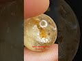 Планета в руках, кварц с рутилом Волосы Венеры