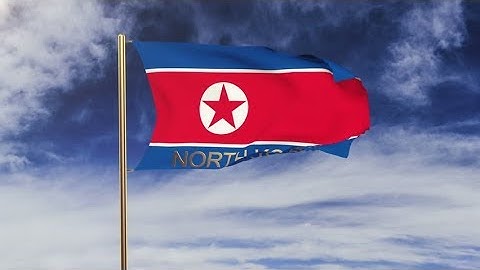 4K North Korea flag with title waving in the wind. Looping sun rises style. Animation loop Stock
