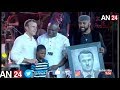 11 YEAR NIGERIAN BOY IMPRESSES FRANCE PRESIDENT EMMANUEL MACRON IN WITH ART WORK