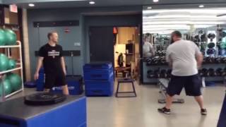 Med ball toss with step