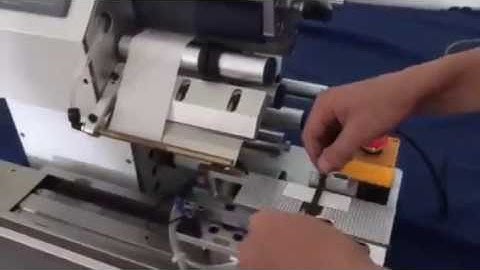 Automatic cable flag applicator