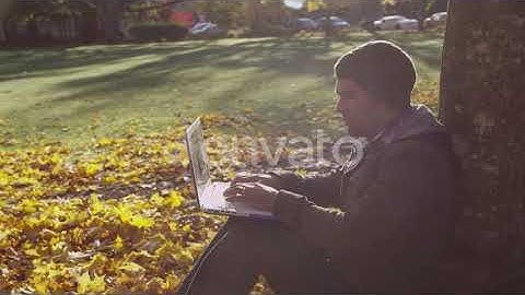 College student on campus using laptop computer | Stock Footage - Envato elements