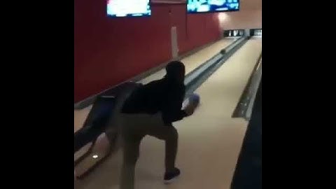 Guy throws bowling ball at tv